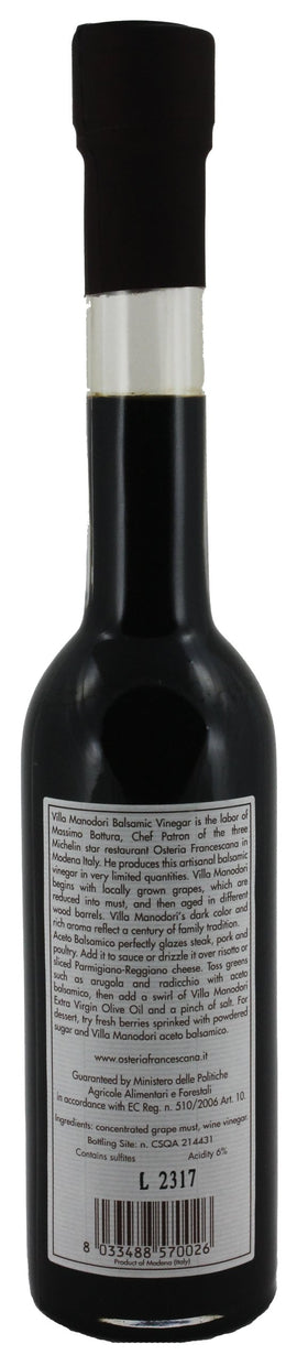 Villa Manodori balsamic vinegar pour shot showing rich glossy texture