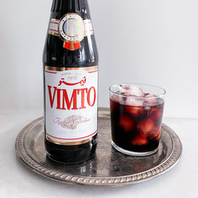 Vimto syrup bottle label displaying iconic flavor profile