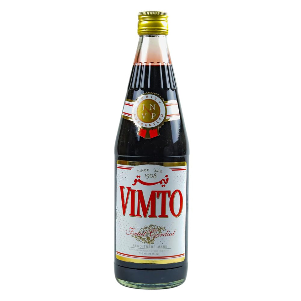 Vimto fruit syrup bottle pour enhances refreshing mixed drinks
