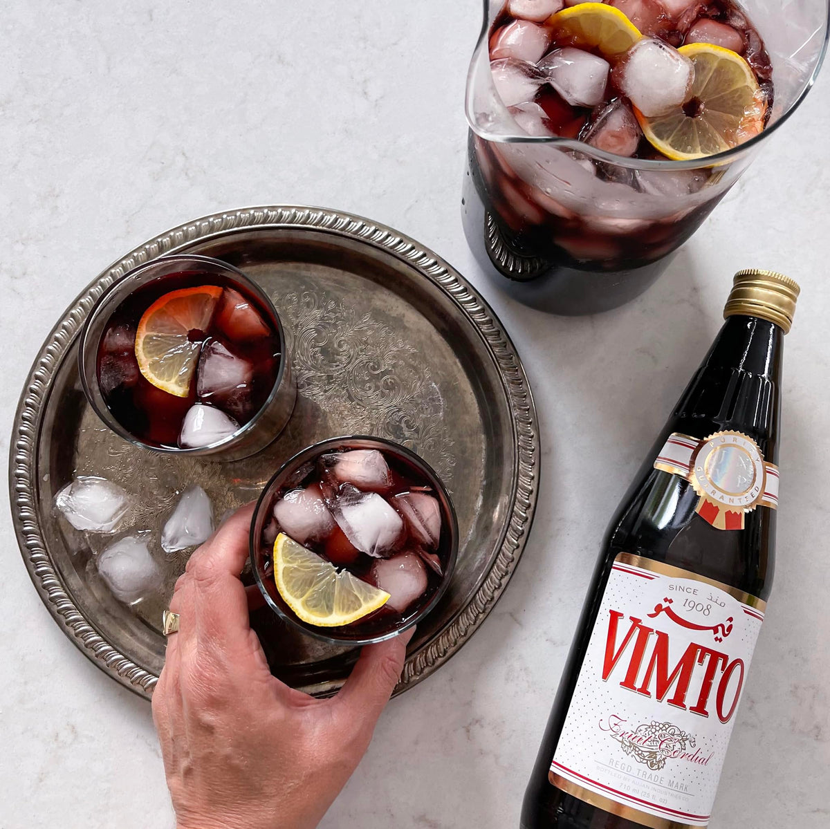 Diluted Vimto in a glass with ice offers fruity refreshment
