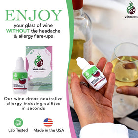 VineLabs sulfite remover drops beside a bottle and a poured wine glass.