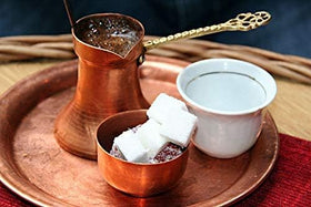 Vispak Zlatna Dzezva traditional Bosnian coffee setup for ritual brewing.