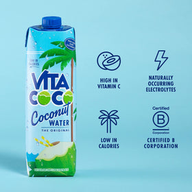 Six-pack of Vita Coco Original kept in fridge for on-the-go hydration.