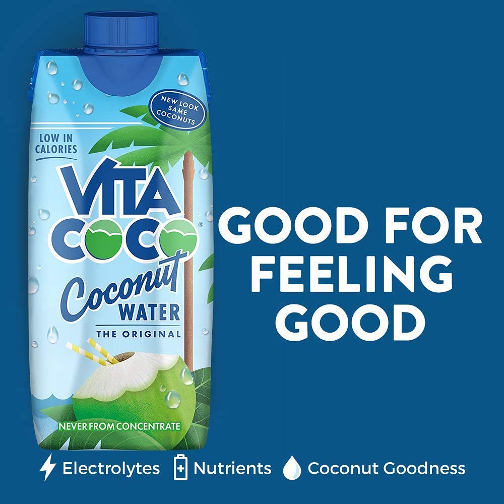 Close-up of Vita Coco Original pouring over ice with tropical flavor.