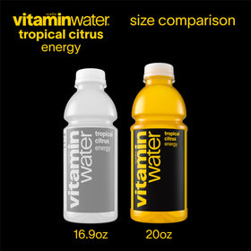 Vitaminwater Energy Tropical Citrus being poured into a glass for refreshing hydration.