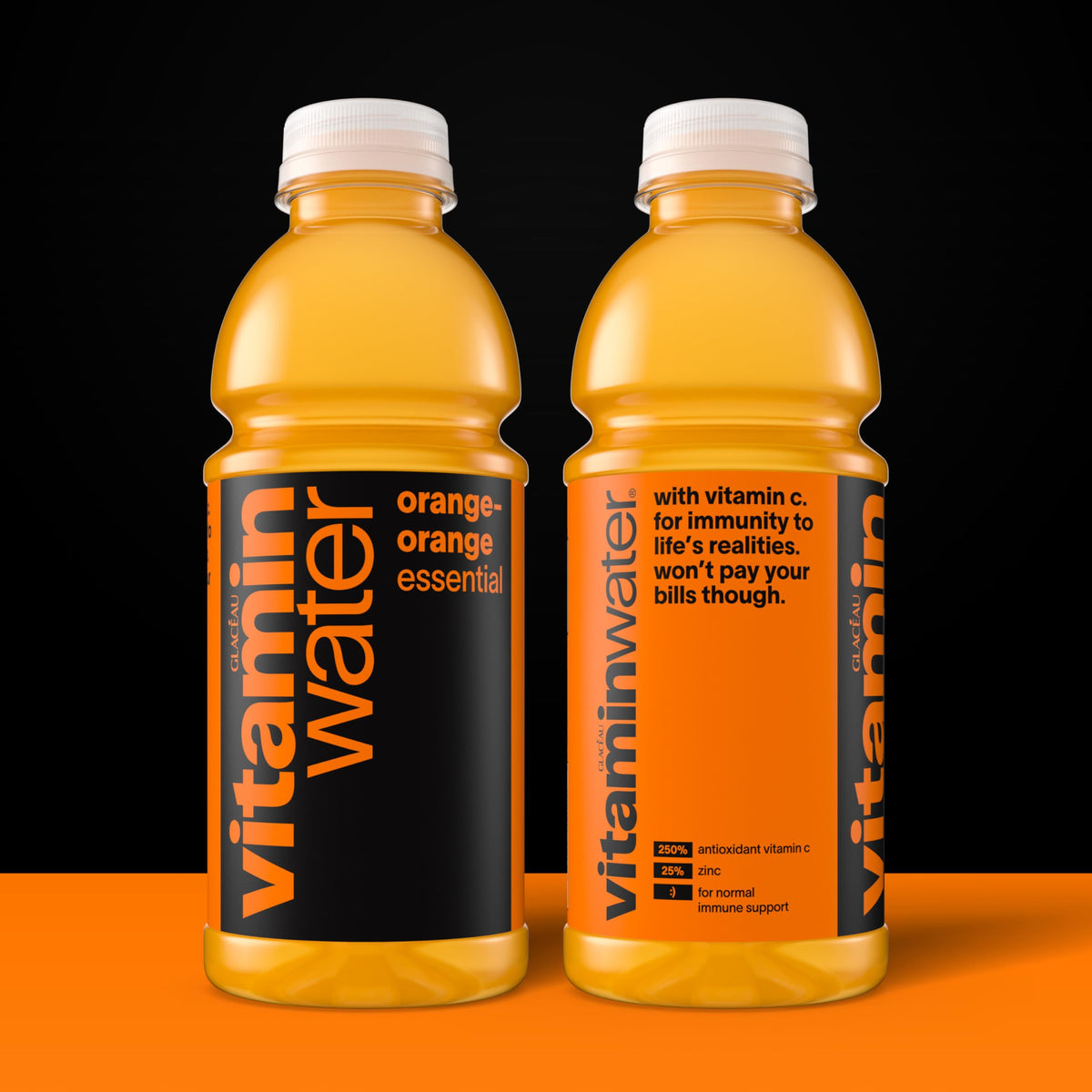 Close-up of Vitaminwater Essential Orange-Orange bottle on front view.