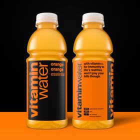 Close-up of Vitaminwater Essential Orange-Orange bottle on front view.