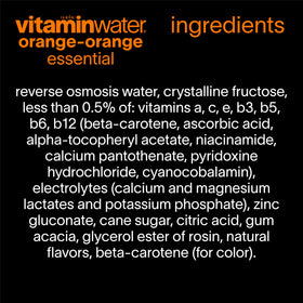 Athlete grabbing a Vitaminwater Essential Orange-Orange before workout.