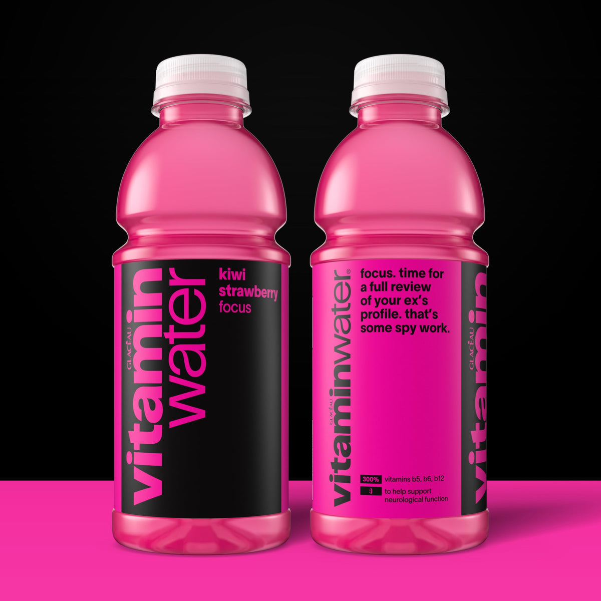 Vitaminwater Focus Kiwi Strawberry being poured into a glass emphasizes refreshing flavor and aroma.