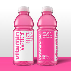 Shine glass with vibrant color highlighting strawberry lemonade refreshment