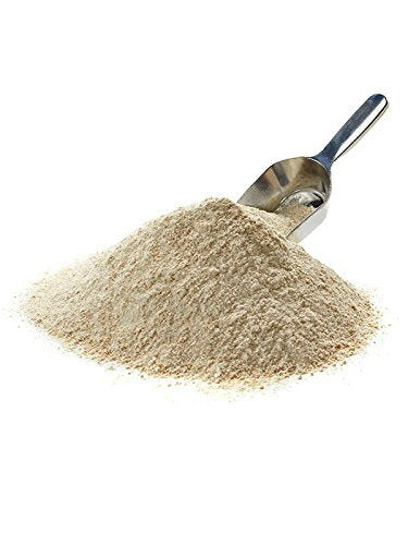 VitaSpelt Nature's Legacy organic spelt flour scoop on counter, ready for recipes.