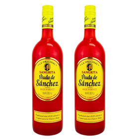 Viuda de Sanchez Sangrita bottle pour beside lime to emphasize tequila pairing.