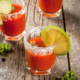 Heritage-inspired Viuda de Sanchez Sangrita on a bar display, celebrating tradition.