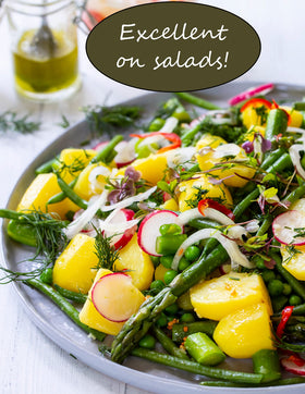 Viva Oliva Peach White Balsamic pour as a glossy glaze for dressings
