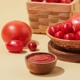Dipping fries with VIVID KITCHEN ketchup for a versatile snack.