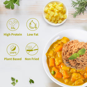 Close-up of VOLO VERO noodles in spicy curry broth, protein-rich