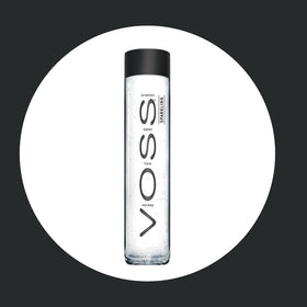 VOSS pouring into glass captures bubbly texture ideal for tasting or pairing.