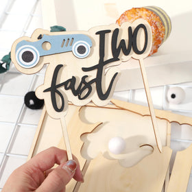 WAUAO two-fast cake topper creates an instant party photo moment.