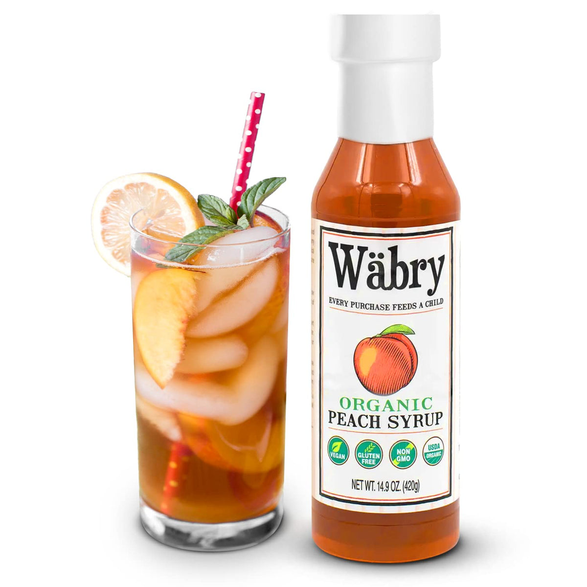 Pouring Wäbry Organic Peach Syrup into a glass for a fruity drink