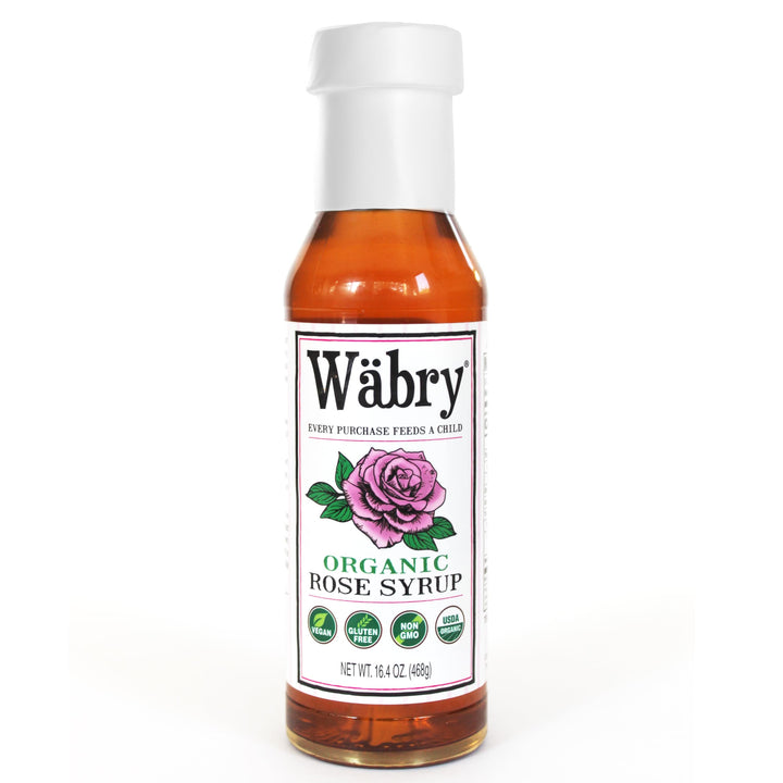 Wabry Organic Rose Syrup bottle front view highlighting vibrant color and latte-friendly presentation.