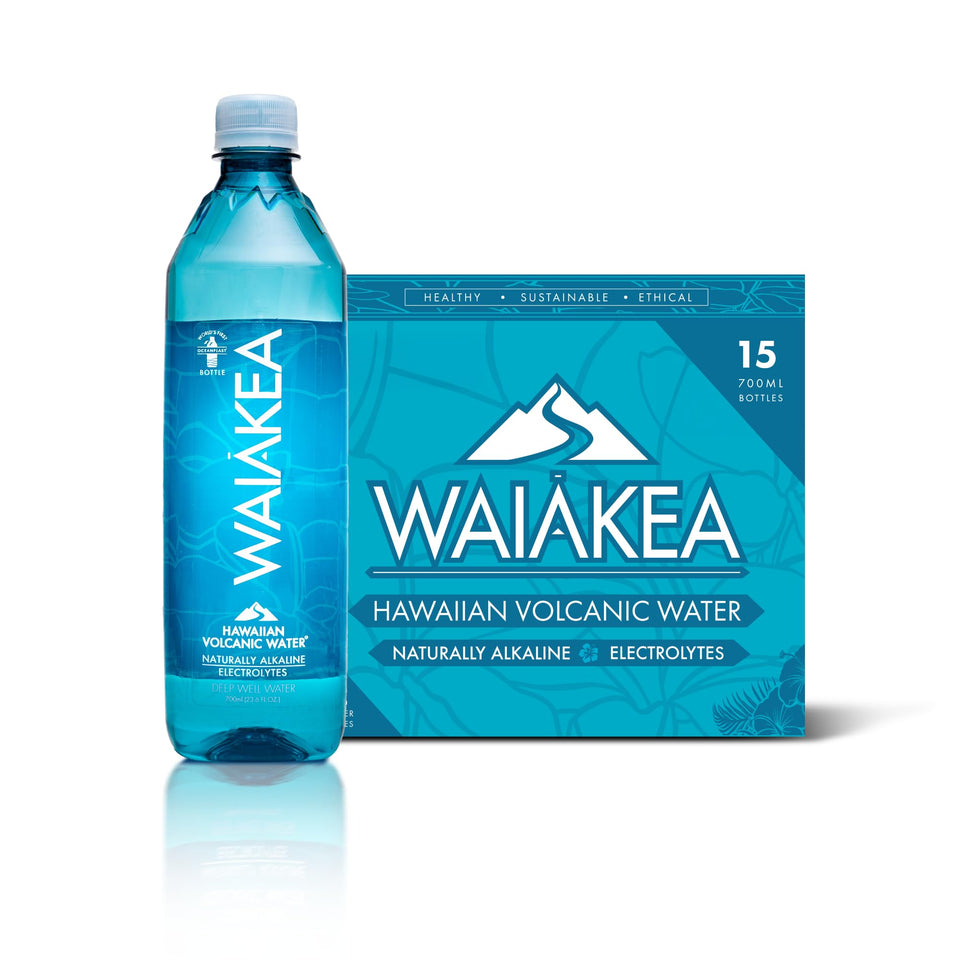 Waiakea Hawaiian volcanic water bottle showing clear hydration with natural minerals.