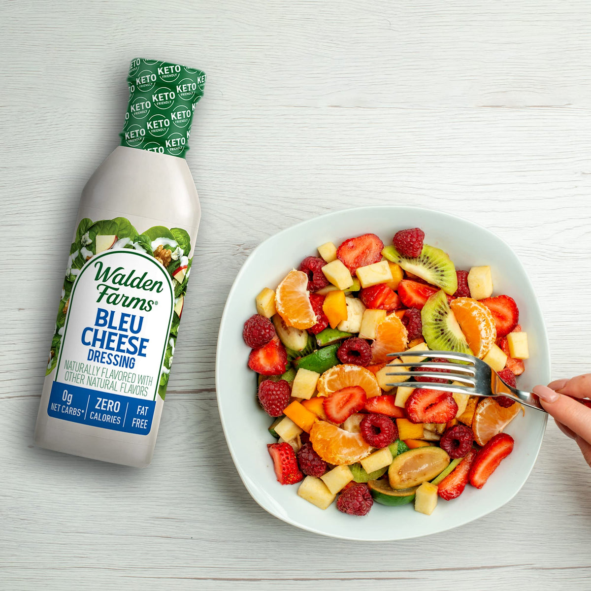 Two bottles of Walden Farms Bleu Cheese Dressing on the kitchen counter.