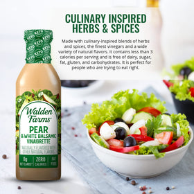 Close-up drizzle of Walden Farms pear vinaigrette over greens