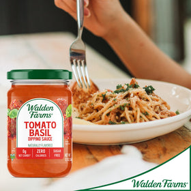 Walden Farms Tomato Basil Pasta Sauce 2-pack added to zucchini noodles for keto-friendly meals.