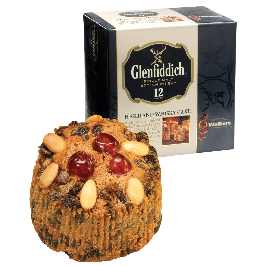 Walker’s Highland Whisky Cake slice on plate showing moist fruit and spice.