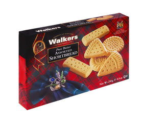 Walker's Shortbread triangles cookies on a plate, perfect with tea
