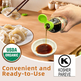 Pouring Wan Ja Shan Dumpling Sauce over dumplings.