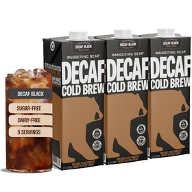 Wandering Bear decaf cold brew bottle on table, smooth afternoon refreshment.