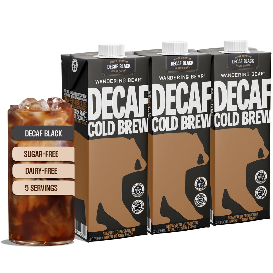 Wandering Bear decaf cold brew bottle on table, smooth afternoon refreshment.