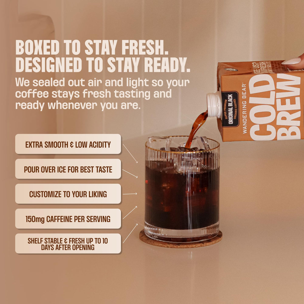 Wandering Bear organic cold brew bottle against morning light signals premium flavor.