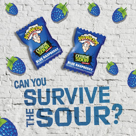 Close-up of Warheads Blue Raspberry candies showing vibrant color and sour coating
