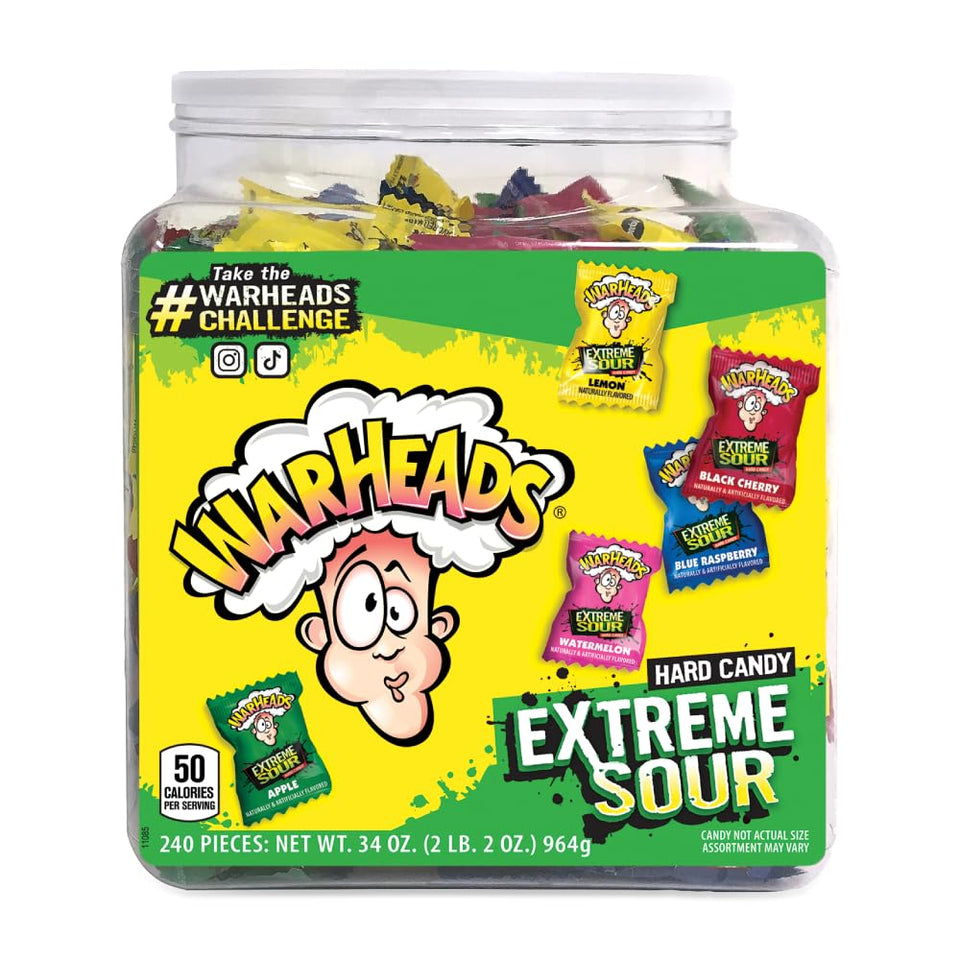 Warheads sour apple tub display for on-the-go snacking and bold flavor.