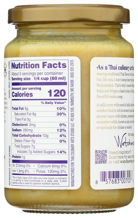 WATCHAREE'S Thai Yellow Curry Sauce bottle pouring into a bowl for creamy curry.