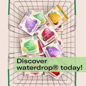 Waterdrop cubes iced tea peach in glass for refreshing sip