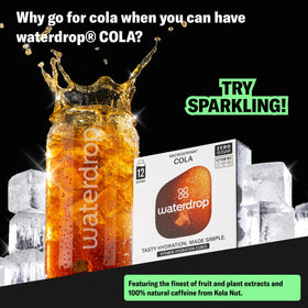 A glass of sparkling water with Waterdrop Cola cubes for refreshing zero-sugar hydration