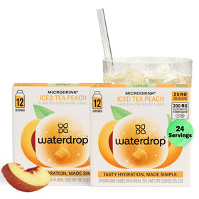 Waterdrop Hydration Cubes dissolving in peach tea for zero-sugar refreshment.
