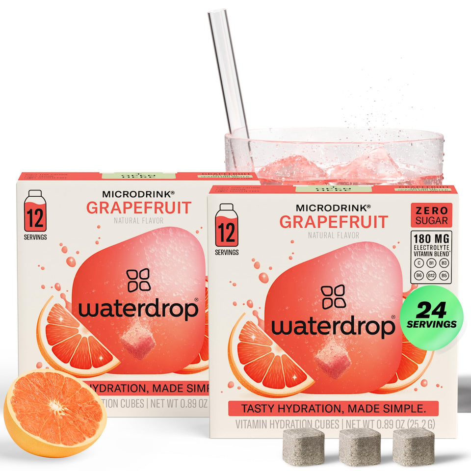 Waterdrop MICRODRINK grapefruit cubes dissolving in water for sugar-free hydration