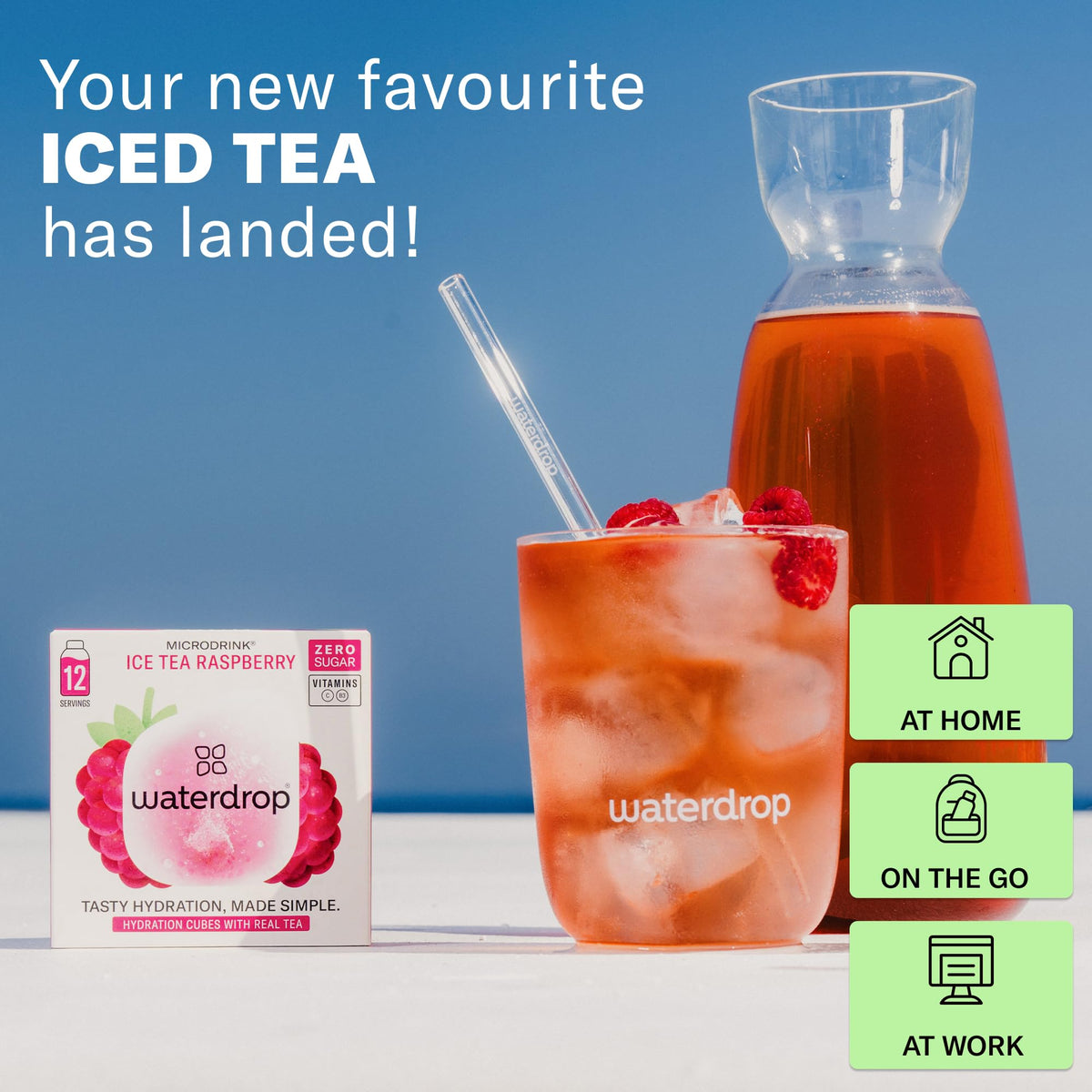 Glass of sparkling water with Waterdrop Microdrink Raspberry Iced Tea cube dissolved.