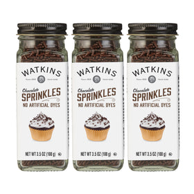 Watkins chocolate decorating sprinkles illuminate cupcakes with vibrant, dye-free color.