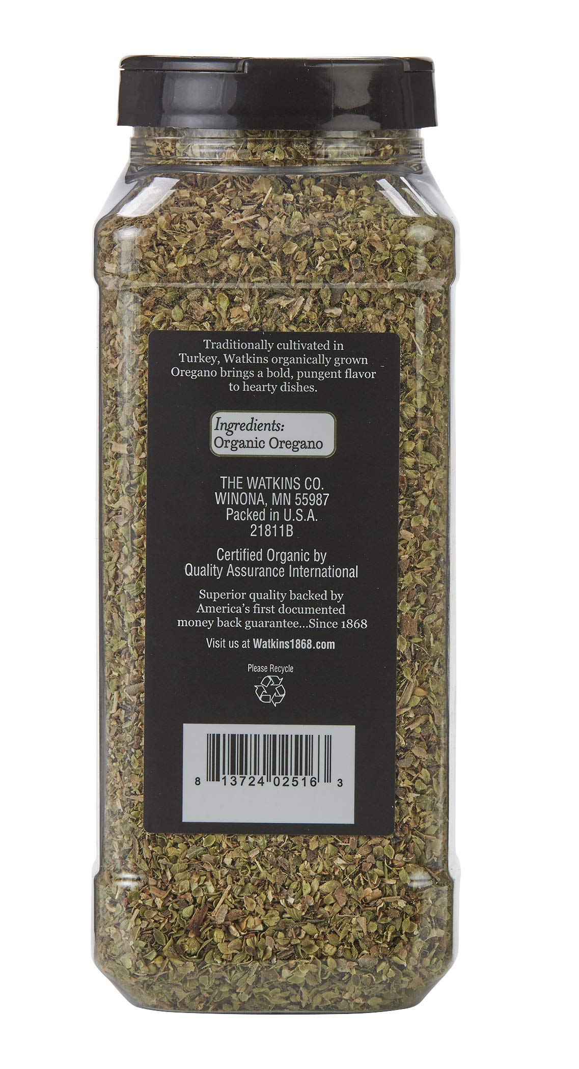 Watkins Organic Oregano bottle being poured, ideal for quick seasoning in recipes.