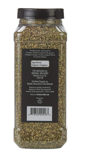 Watkins Organic Oregano bottle being poured, ideal for quick seasoning in recipes.