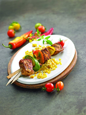 Watkins Organic Paprika used as a rub on grilled meat for flavor depth