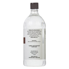Watkins almond extract label close-up showing pure ingredients