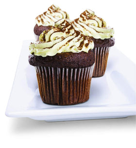 Watkins Root Beer Concentrate pour action shows rich flavor for drinks and desserts.
