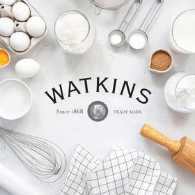USA-made Watkins vanilla extract packaging on a kitchen counter.
