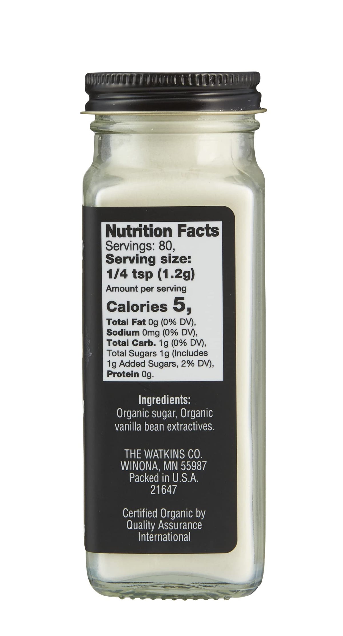 Watkins Vanilla Powder dispensing spoon close-up for precise flavoring.